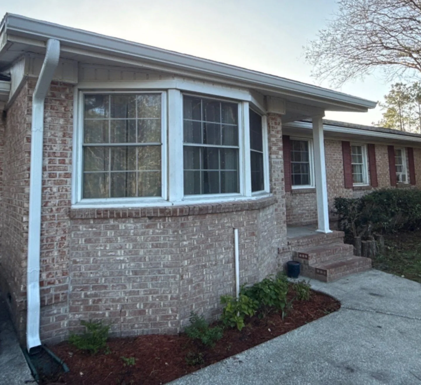 Completed exterior restoration on a brick home